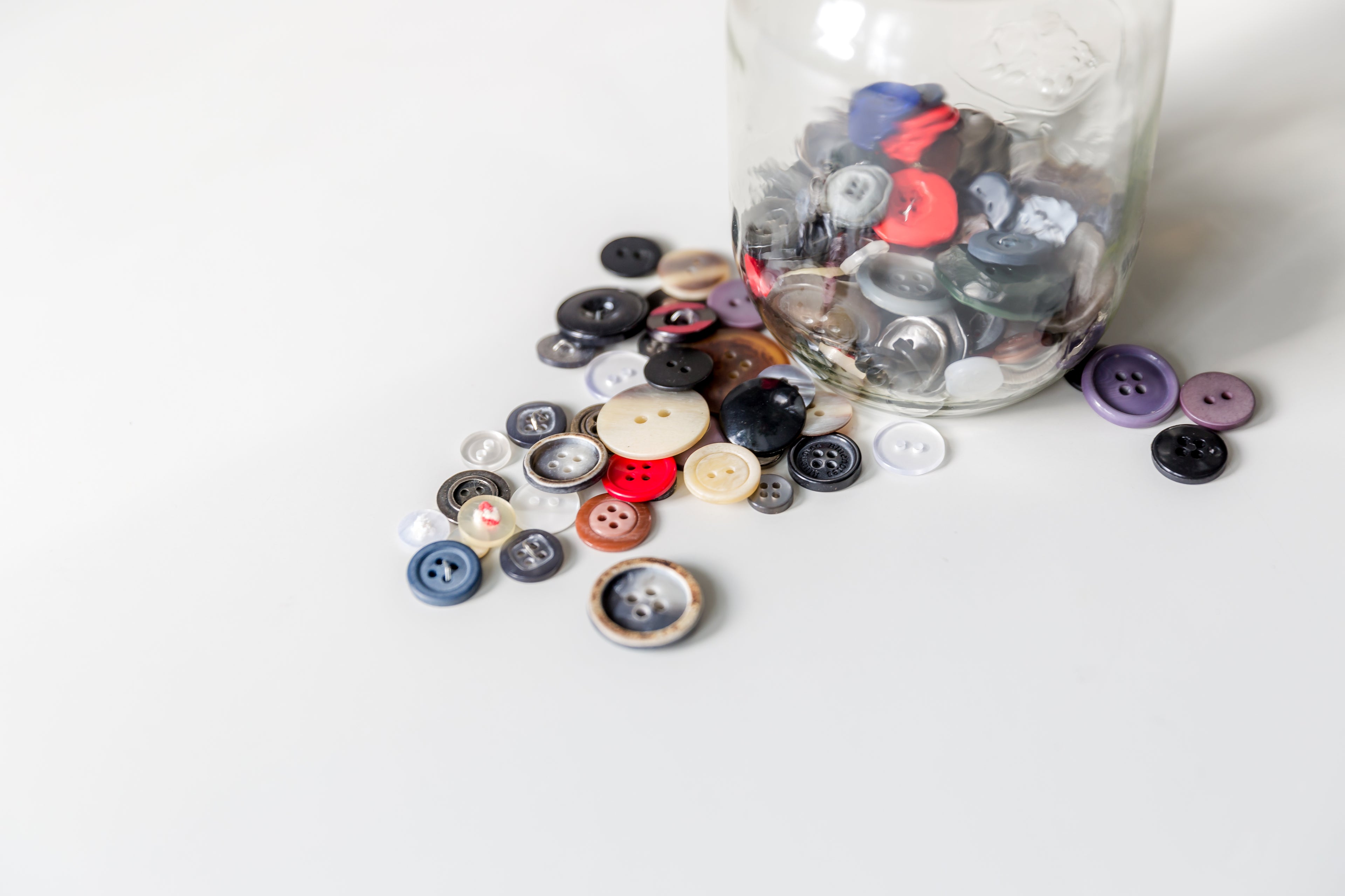 Load video: How to sew on buttons
